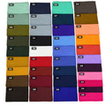 A grid of 40 fabric color swatches, each labeled with a number from 01 to 40, arranged in four columns on a light-colored tiled floor. The swatches represent a wide range of colors including green, blue, purple, red, orange, pink, brown, and white.