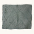 A square piece of sheer gray fabric with a subtle diamond grid pattern and small scattered bead accents, laid flat against a light cream background.