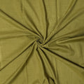 A swatch of olive green Turkish lawn fabric with a checkered-stitching design.