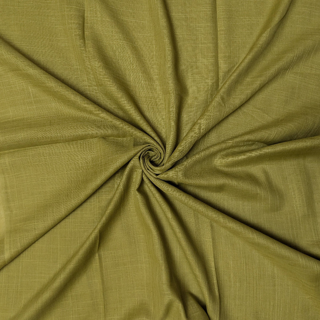 A swatch of olive green Turkish lawn fabric with a checkered-stitching design.