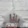 White chiffon dupatta with black tufted motifs and floral scalloped border