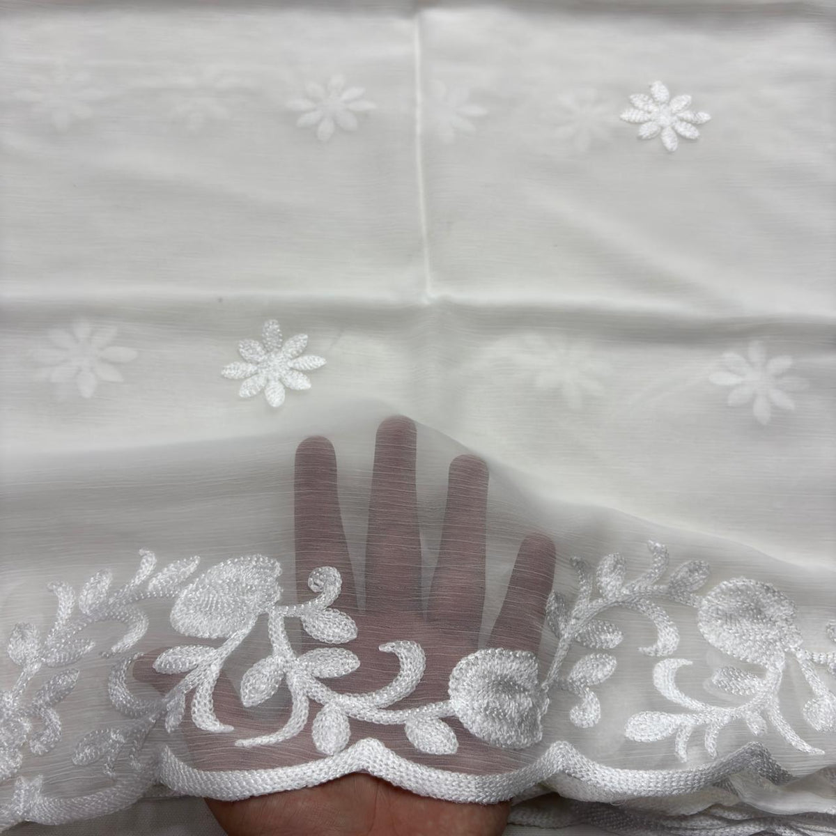 Black chiffon dupatta with white embroidered four-petal flowers and scalloped medallion leaf border