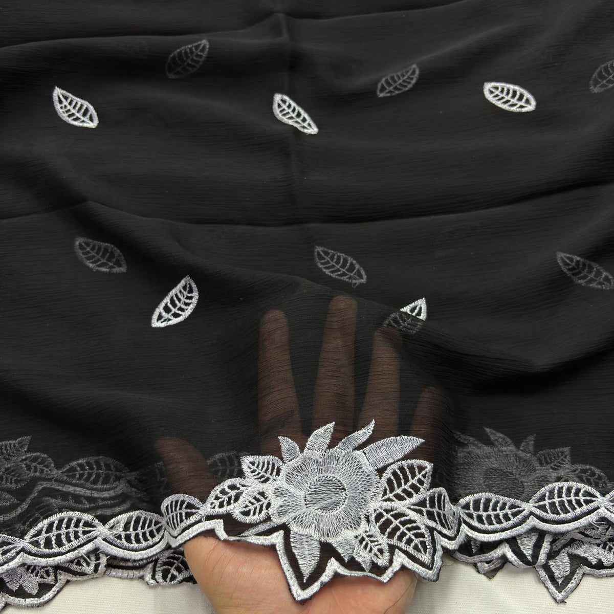 White chiffon dupatta with white star flowers and diamond lattice border