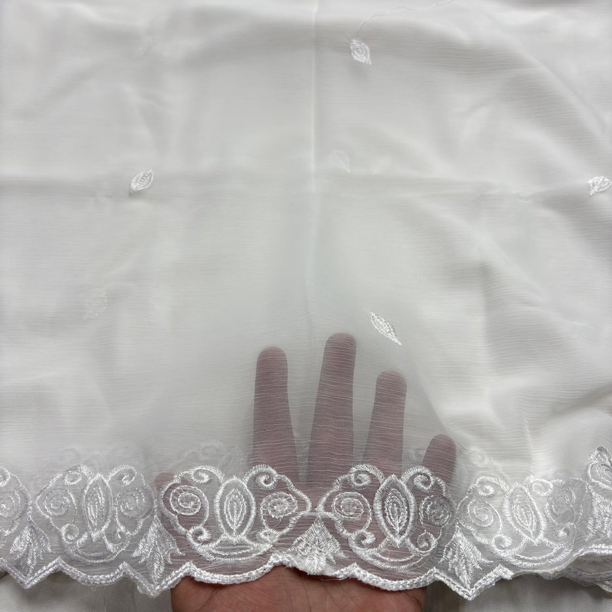White chiffon dupatta with black wavy flower vines and heart floral border